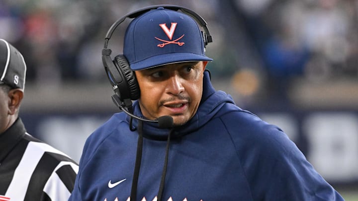 Nov 16, 2024; South Bend, Indiana, USA; Virginia Cavaliers head coach Tony Elliott watches in the second quarter against the Notre Dame Fighting Irish at Notre Dame Stadium. Mandatory Credit: Matt Cashore-Imagn Images Nov 16, 2024; South Bend, Indiana, USA; Virginia Cavaliers head coach Tony Elliott watches in the second quarter against the Notre Dame Fighting Irish at Notre Dame Stadium. Mandatory Credit: Matt Cashore-Imagn Images