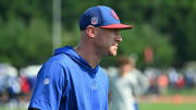 Jul 24, 2024; Rochester, NY, USA; Buffalo Bills offensive coordinator Joe Brady watches a training camp session at St. John Fisher University. Mandatory Credit: Mark Konezny-USA TODAY Sports