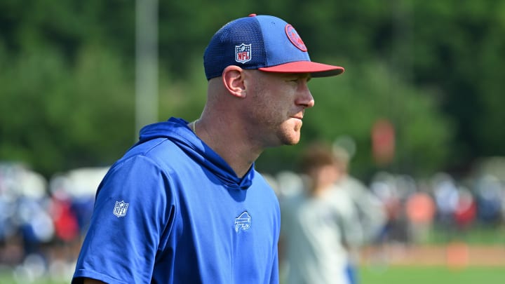 Jul 24, 2024; Rochester, NY, USA; Buffalo Bills offensive coordinator Joe Brady watches a training camp session at St. John Fisher University. Mandatory Credit: Mark Konezny-USA TODAY Sports