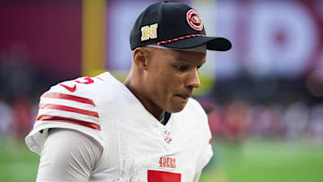 Jan 5, 2025; Glendale, Arizona, USA; San Francisco 49ers quarterback Joshua Dobbs (5) against the Arizona Cardinals at State Farm Stadium. Mandatory Credit: Mark J. Rebilas-Imagn Images
