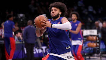 Dec 23, 2023; Brooklyn, New York, USA; Detroit Pistons forward Isaiah Livers (12) warms up before a game against the Brooklyn Nets at Barclays Center.