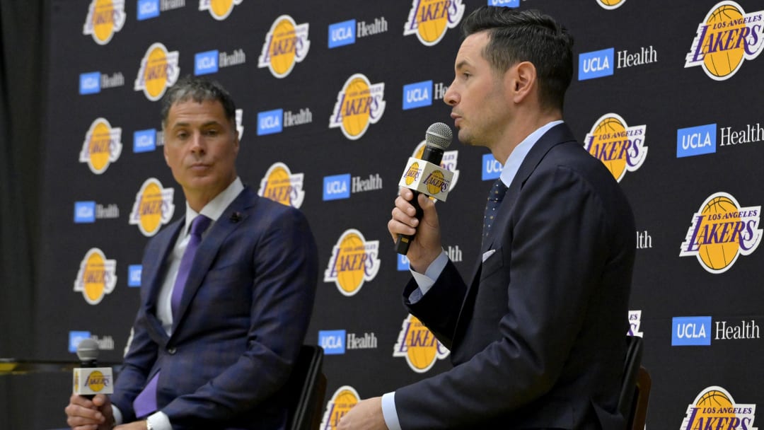Jun 24, 2024; El Segundo, CA, USA; Los Angeles Lakers general manager Rob Pelinka looks on as head coach JJ Redick speaks to the media during an introductory news conference at the UCLA Health Training Center. Mandatory Credit: Jayne Kamin-Oncea-USA TODAY Sports