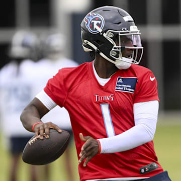 Tennessee Titans quarterback Cam Ward (1) throws a pass as he goes through drills during Rookie Mini Camp at Saint Thomas Sports Park. 