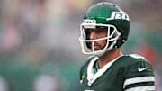 Sep 29, 2024; East Rutherford, New Jersey, USA;  New York Jets quarterback Aaron Rodgers (8) looks on during the first half against the Denver Broncos at MetLife Stadium.