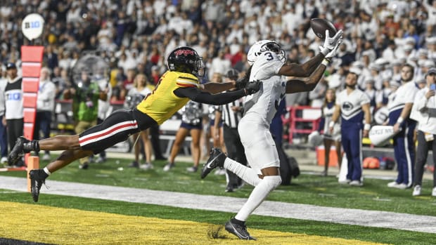 Penn State Nittany Lions wide receiver Dante Cephas (3) catches a pass in front of a Maryland Terrapins defensive back.