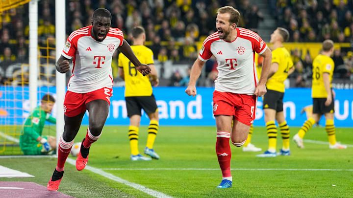 Dayot Upamecano und Harry Kane jubeln im Signal-Iduna-Park
