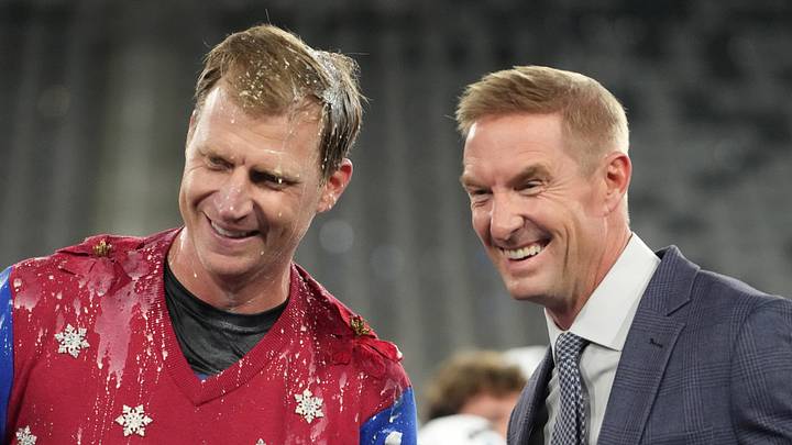Jan 2, 2026; San Diego, CA, USA; SMU Mustangs head coach Rhett Lashlee (left) poses with Fox Sports broadcaster Joel Klatt after victory over the Arizona Wildcats in the Holiday Bowl at Snapdragon Stadium. Mandatory Credit: Kirby Lee-Imagn Images