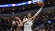 Mar 30, 2025; Milwaukee, Wisconsin, USA;  Milwaukee Bucks forward Giannis Antetokounmpo (34) shoots during the second quarter against the Atlanta Hawks at Fiserv Forum. Mandatory Credit: Jeff Hanisch-Imagn Images