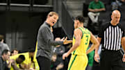 Jan 2, 2025; Eugene, Oregon, USA; Oregon Ducks head coach Dana Altman with instruction for Oregon Ducks guard Jackson Shelstad (3) during the second half against the Illinois Fighting Illini at Matthew Knight Arena. Mandatory Credit: Craig Strobeck-Imagn Images
