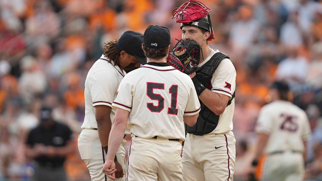 Cincinnati pitcher Kellen O'Connor (51), Cincinnati catcher Jack Natili (7) and Cincinnati's Christian Mitchelle (3) talk on the pitchers mound during a NCAA regional baseball game between the Tennessee Volunteers and Cincinnati Bearcats at Lindsey Nelson Stadium in Knoxville, Tenn., on May 31, 2025.