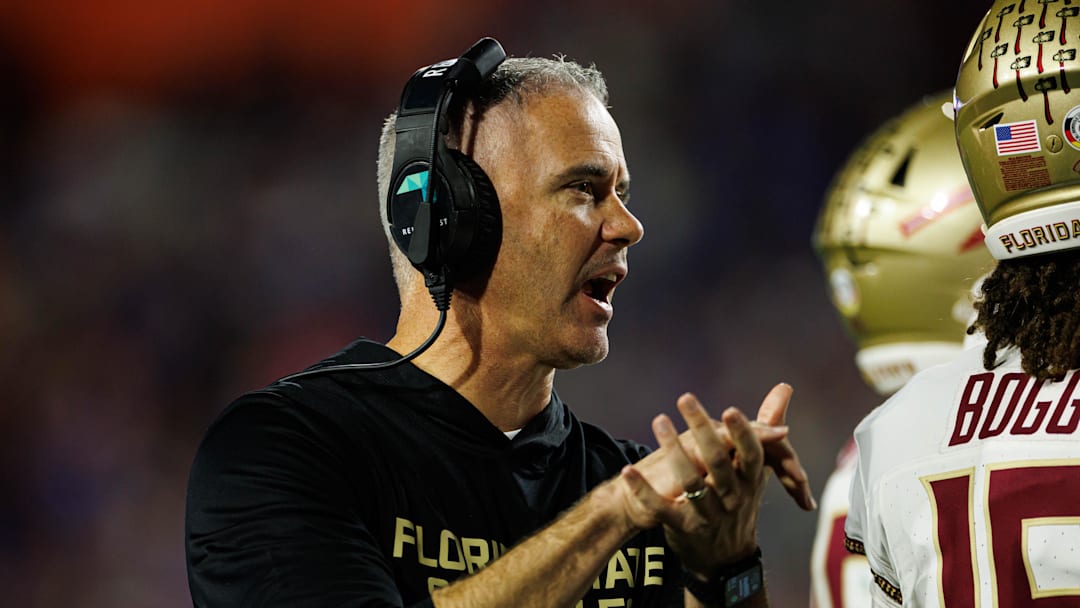 Nov 29, 2025; Gainesville, Florida, USA; Florida State Seminoles head coach Mike Norvell gestures against the Florida Gators during the second half at Ben Hill Griffin Stadium. Mandatory Credit: Matt Pendleton-Imagn Images