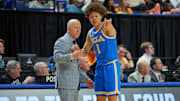 Mar 22, 2025; Lexington, KY, USA; UCLA Bruins head coach Mick Cronin talks with guard Trent Perry (1) during the first half against the Tennessee Volunteers in the second round of the NCAA Tournament at Rupp Arena. Mandatory Credit: Aaron Doster-Imagn Images