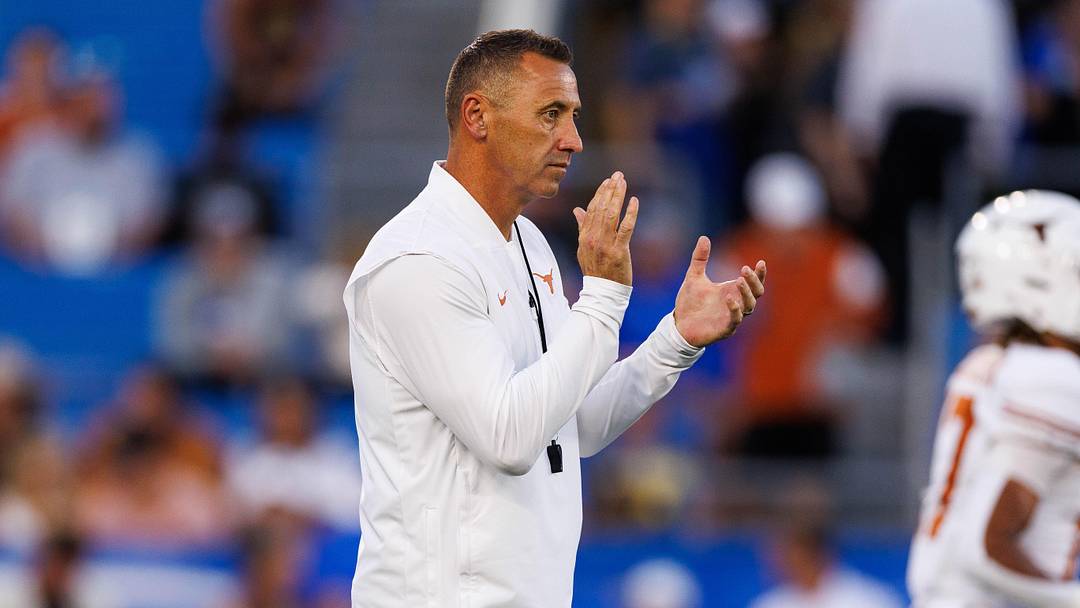 Texas Longhorns head coach Steve Sarkisian claps during warmups before the game against the Kentucky Wildcats at Kroger Field. Texas Longhorns head coach Steve Sarkisian claps during warmups before the game against the Kentucky Wildcats at Kroger Field.