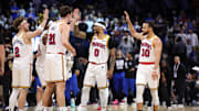 Feb 27, 2025; Orlando, Florida, USA; Golden State Warriors guard Stephen Curry (30) celebrates with guard Gary Payton II (0) center Quinten Post (21) after a play against the Orlando Magic in the fourth quarter at Kia Center. Mandatory Credit: Nathan Ray Seebeck-Imagn Images