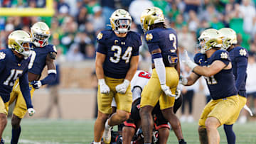 Notre Dame linebacker Drayk Bowen (34) celebrates after getting a stop in the second half of a NCAA football game against NC State at Notre Dame Stadium on Saturday, Oct. 11, 2025, in South Bend.