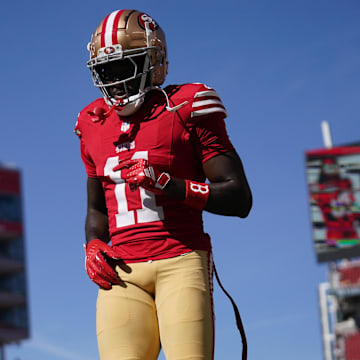 Oct 20, 2024; Santa Clara, California, USA; San Francisco 49ers wide receiver Brandon Aiyuk (11) walks on the field before the start of the game against the Kansas City Chiefs at Levi's Stadium. Mandatory Credit: Cary Edmondson-Imagn Images