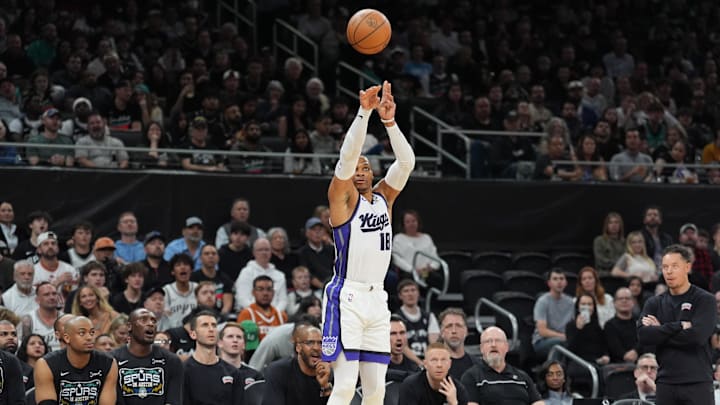 Feb 21, 2026; Austin, Texas, USA;  Sacramento Kings guard Russell Westbrook (18) shoots in the second half against the San Antonio Spurs at Moody Center. Mandatory Credit: Daniel Dunn-Imagn Images