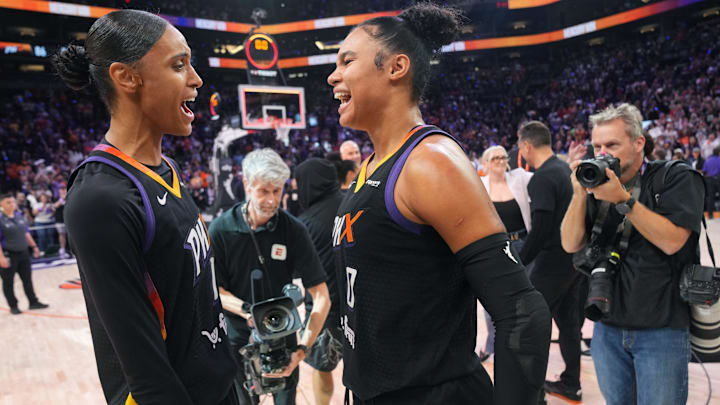 Phoenix Mercury teammates Satou Sabally (0) and DeWanna Bonner (14) celebrate their 86-81 WNBA semifinal playoff series win over the Minnesota Lynx at PHX Arena on Sept. 28, 2025. Phoenix Mercury teammates Satou Sabally (0) and DeWanna Bonner (14) celebrate their 86-81 WNBA semifinal playoff series win over the Minnesota Lynx at PHX Arena on Sept. 28, 2025.