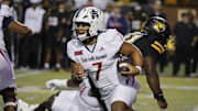 Sep 19, 2024; Boone, North Carolina, USA;  South Alabama Jaguars quarterback Gio Lopez (7) runs the ball against the Appalachian State Mountaineers during the first quarter at Kidd Brewer Stadium. Mandatory Credit: Reinhold Matay-Imagn Images