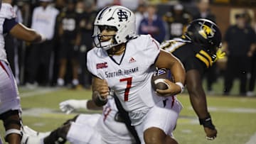 Sep 19, 2024; Boone, North Carolina, USA;  South Alabama Jaguars quarterback Gio Lopez (7) runs the ball against the Appalachian State Mountaineers during the first quarter at Kidd Brewer Stadium. Mandatory Credit: Reinhold Matay-Imagn Images