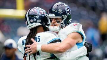 Tennessee Titans quarterback Will Levis (8) hugs wide receiver DeAndre Hopkins (10) before a game against the Houston Texans at NRG Stadium in Houston, Texas., Sunday, Dec. 31, 2023