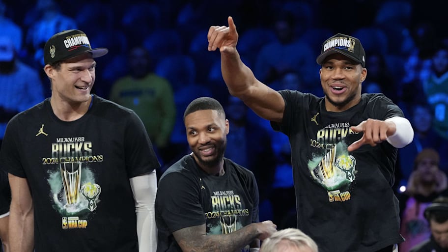 Brook Lopez, Damian Lillard and Giannis Antetokounmpo celebrate winning the Emirates NBA Cup in December. | Kyle Terada-Imagn Images
