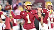 Boston College Eagles quarterback Thomas Castellanos warms up before a game against the Louisville Cardinals at Alumni Stadium. 