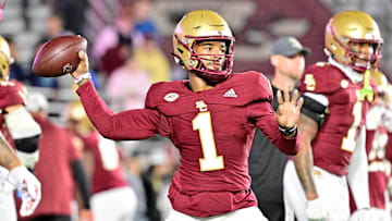 Boston College Eagles quarterback Thomas Castellanos warms up before a game against the Louisville Cardinals at Alumni Stadium. 
