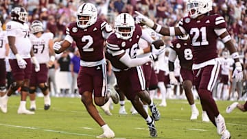 Oct 19, 2024; Starkville, Mississippi, USA; Mississippi State Bulldogs linebacker Zakari Tillman (16) reacts with teammates after an interception against the Texas A&M Aggies during the fourth quarter at Davis Wade Stadium at Scott Field. Mandatory Credit: Matt Bush-Imagn Images