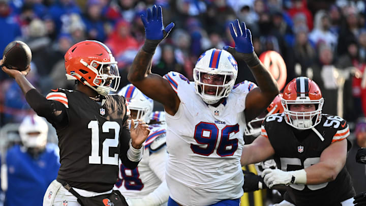 Dec 21, 2025; Cleveland, Ohio, USA;  Buffalo Bills defensive tackle Deone Walker (96)v applies pressure on Cleveland Browns quarterback Shedeur Sanders (12) during the second half at Huntington Bank Field. Mandatory Credit: Ken Blaze-Imagn Images