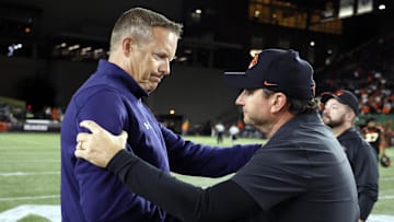 Portland, Oregon, USA; Montana State Bobcats head coach Brent Vigen (left) and Oregon State Beavers head coach Jonathan Smith (right) greet after the game at Providence Park.