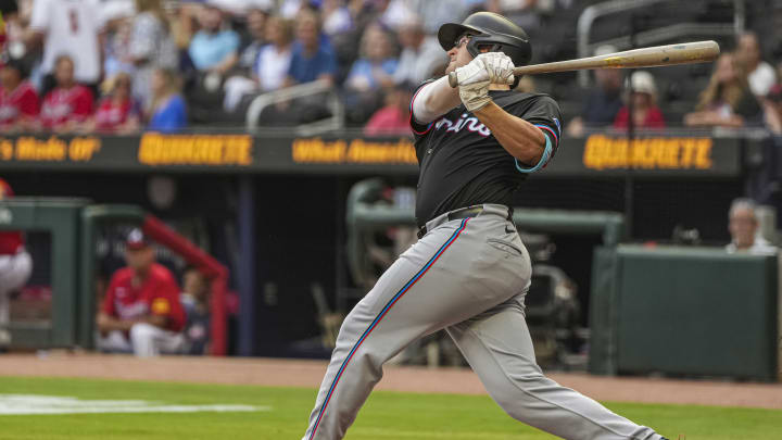 Aug 2, 2024; Cumberland, Georgia, USA; Miami Marlins first baseman Jonah Bride (41) hits a two run home run against the Atlanta Braves during the first inning at Truist Park. Mandatory Credit: Dale Zanine-USA TODAY Sports