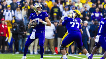 Oct 5, 2024; Seattle, Washington, USA; Washington Huskies quarterback Will Rogers (7) passes against the Michigan Wolverines during the first quarter at Alaska Airlines Field at Husky Stadium. Mandatory Credit: Joe Nicholson-Imagn Images