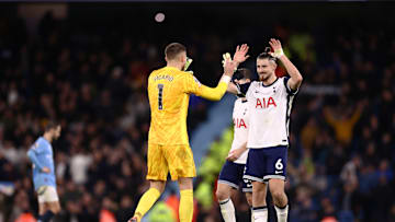 Guglielmo Vicario and Radu Dragusin congratulate each other on the clean sheet against Manchester City