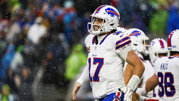 Buffalo Bills quarterback Josh Allen celebrates after throwing a touchdown pass against the Seattle Seahawks