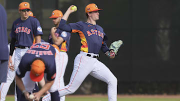 Houston Astros starting pitcher Forrest Whitley (60) works out during spring training practice at CACTI Park of the Palm Beaches.