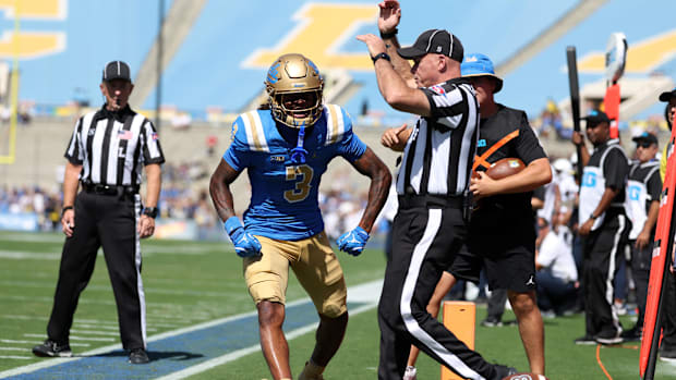UCLA Bruins wide receiver Kwazi Gilmer reacts after scoring a touchdown against Penn State Nittany Lions.