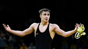 Iowa’s Drake Ayala reacts after defeating Oklahoma State's Rin Sakamoto in a 133-pound match Sunday, Feb. 23, 2025 at Carver-Hawkeye Arena in Iowa City, Iowa.