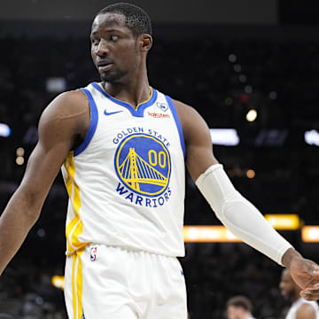 Golden State Warriors forward Jonathan Kuminga (00) reacts to a call by an official during the first half against the San Antonio Spurs at Frost Bank Center. 