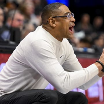 Mar 12, 2025; Nashville, TN, USA;  Texas Longhorns head coach Rodney Terry cheers his team on against the Vanderbilt Commodores during the second half at Bridgestone Arena. Mandatory Credit: Steve Roberts-Imagn Images
