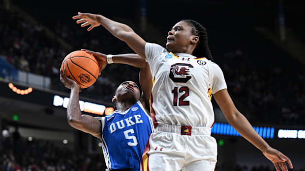 Duke's Oluchi Okananwa shoots the ball against MiLaysia Fulwiley in the Elite Eight. 