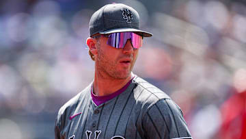 Jul 20, 2025; New York City, New York, USA; New York Mets first baseman Pete Alonso (20) looks back during the seventh inning against the Cincinnati Reds at Citi Field. Mandatory Credit: Vincent Carchietta-Imagn Images
