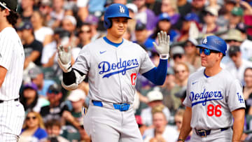 Sep 29, 2024; Denver, Colorado, USA; Los Angeles Dodgers designated hitter Shohei Ohtani (17) celebrates his single during the eighth inning against the Colorado Rockies at Coors Field. Mandatory Credit: Ron Chenoy-Imagn Images