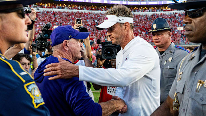 LSU head coach Brian Kelly and Ole Miss head coach Lane Kiffin shake hands after a college football game between Ole Miss and LSU at Vaught-Hemingway Stadium in Oxford, Miss., on Saturday, Sept. 27, 2025. Ole Miss defeated LSU 24-19.