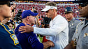 LSU head coach Brian Kelly and Ole Miss head coach Lane Kiffin shake hands after a college football game between Ole Miss and LSU at Vaught-Hemingway Stadium in Oxford, Miss., on Saturday, Sept. 27, 2025. Ole Miss defeated LSU 24-19.