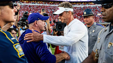 LSU head coach Brian Kelly and Ole Miss head coach Lane Kiffin shake hands after a college football game between Ole Miss and LSU at Vaught-Hemingway Stadium in Oxford, Miss., on Saturday, Sept. 27, 2025. Ole Miss defeated LSU 24-19.