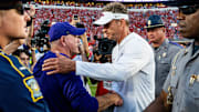 LSU head coach Brian Kelly and Ole Miss head coach Lane Kiffin shake hands after a college football game between Ole Miss and LSU at Vaught-Hemingway Stadium in Oxford, Miss., on Saturday, Sept. 27, 2025. Ole Miss defeated LSU 24-19.