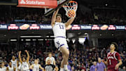 Jan 22, 2025; Evanston, Illinois, USA; Northwestern Wildcats guard Brooks Barnhizer (13) dunks the ball against the Indiana Hoosiers during the second half at Welsh-Ryan Arena. Mandatory Credit: David Banks-Imagn Images