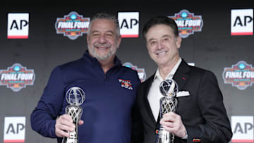 Apr 4, 2025; San Antonio, TX, USA; Auburn Tigers head coach Bruce Pearl and St. John's head coach Rick Pitino pose for a photo after both receiving the Coach of the Year award at Alamodome. Mandatory Credit: Scott Wachter-Imagn Images
