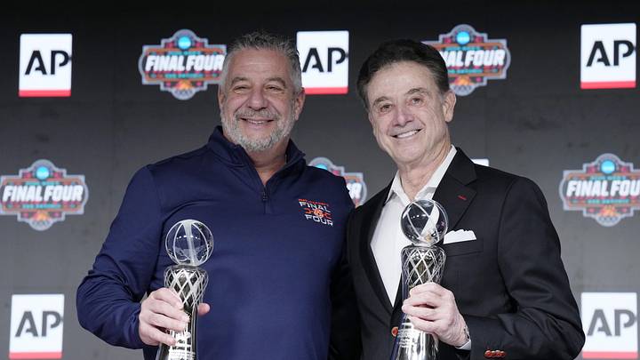 Apr 4, 2025; San Antonio, TX, USA; Auburn Tigers head coach Bruce Pearl and St. John's head coach Rick Pitino pose for a photo after both receiving the Coach of the Year award at Alamodome. Mandatory Credit: Scott Wachter-Imagn Images